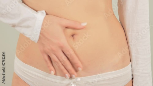 Wallpaper Mural 4k Pregnant girl stroking her belly. Slow motion Torontodigital.ca