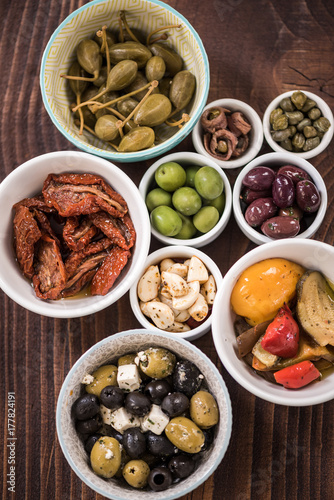 Selection of tapas in ceramic bowls