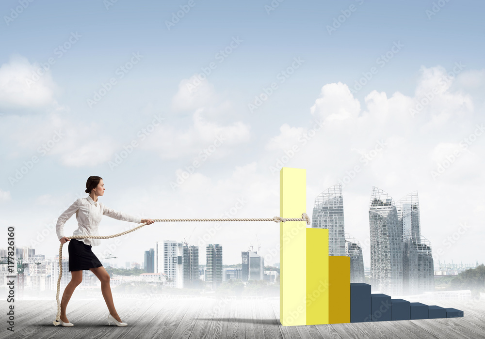 Businesswoman pulling arrow with rope and making it raise up Businesswoman pulling arrow with rope and making it raise up