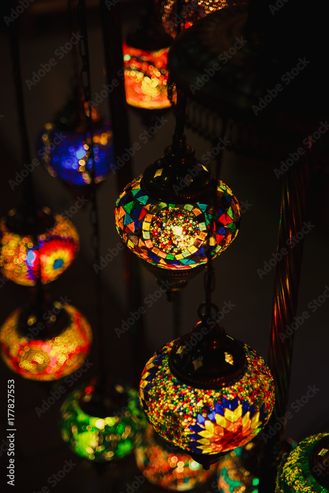 Beautiful Moroccan lamps in the market. Bright oriental vertical background.