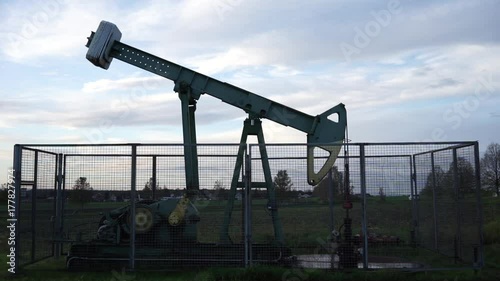 Pumping unit is working in oil field in Lower Saxony near Hannover photo