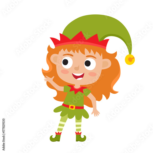 Cute little Christmas girl elf smiling and standing