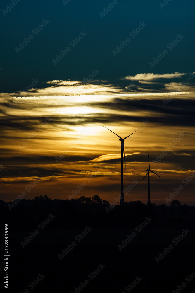 sunrise with windmills