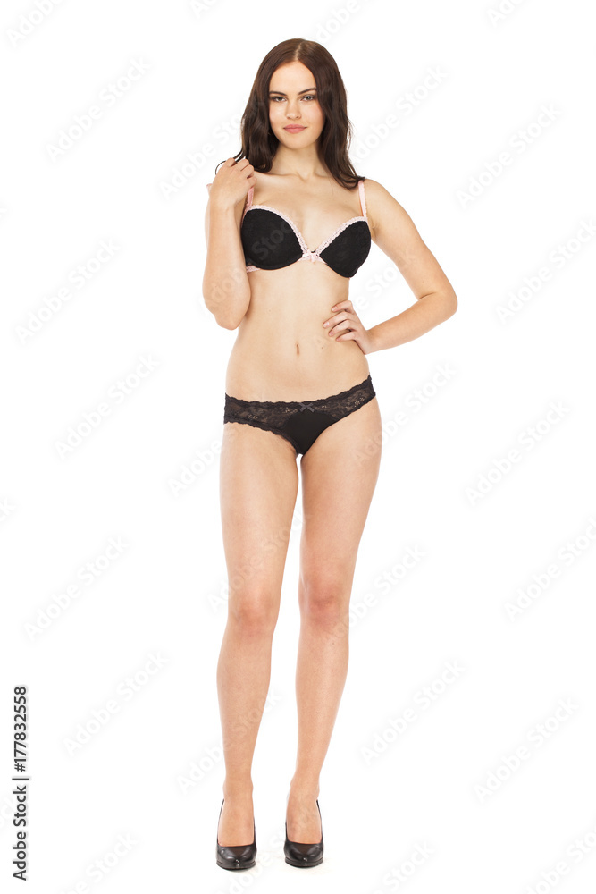Full portrait of sexy lady in black lingerie, isolated on white background Full portrait of sexy lady in black lingerie, isolated on white background