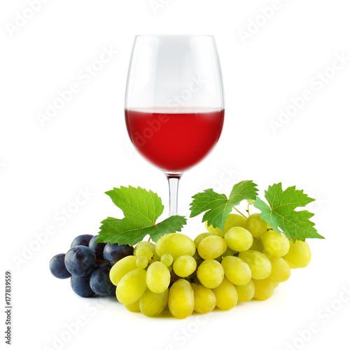 Bunch grapes with green fresh leaves and glass red wine isolated on white