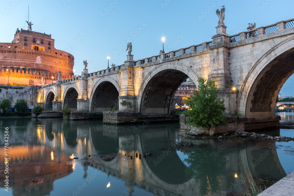 Amazing Sunset view of St. Angelo Bridge and castle st. Angelo in city of Rome, Italy