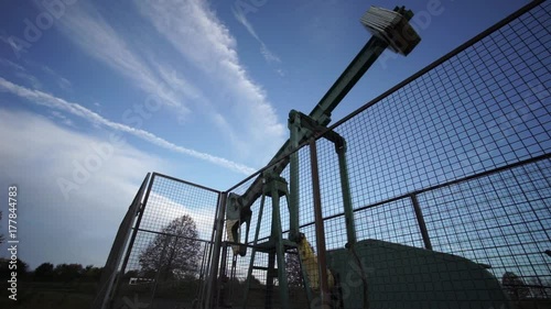 Pumping unit is working in oil field in Lower Saxony near Hannover photo