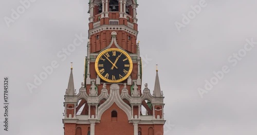 Moscow Kremlin Main Clock named Kuranti on Spasskaya Tower. Red Square. Timelapse. photo