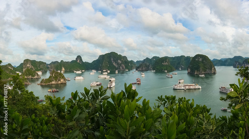 Panoramic view of Halong Bay with cruise ships and boats