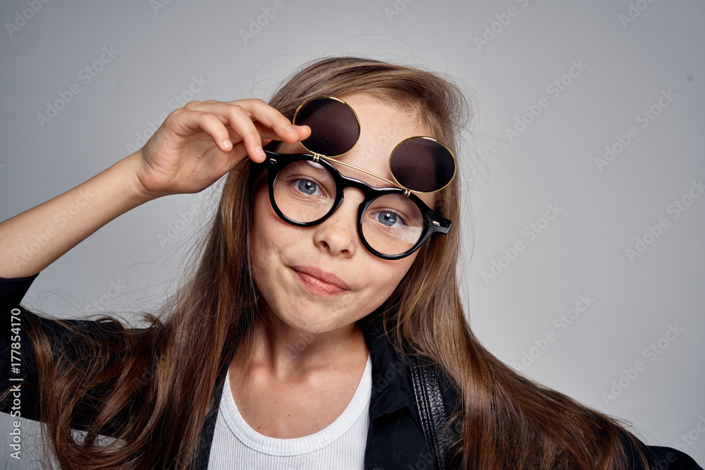 portrait of a girl in black strange glasses portrait of a girl in black strange glasses