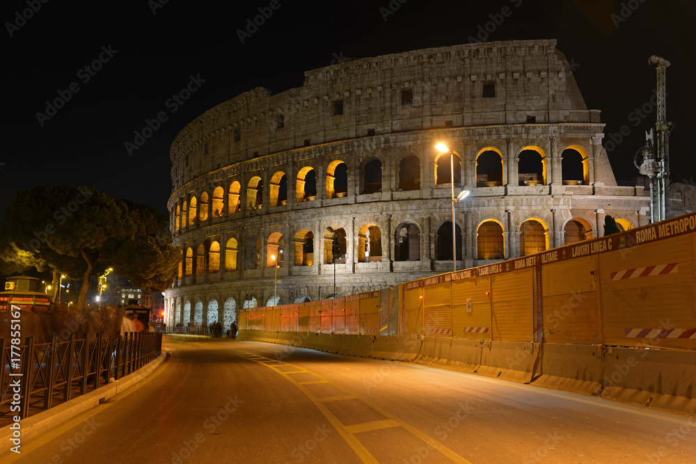 The Colosseum at night, a place where gladiators fought as well as being a venue for public entertainment, Rome Italy