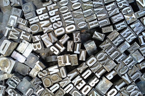 Old antique metal printing letters from a printing press
