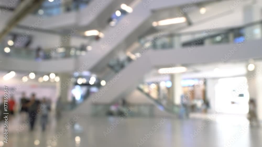Blurred Background with people in the shopping malls scene Blurred Background with people in the shopping malls scene