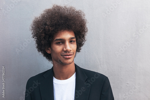 Portrait of a young afro black man smiling. photo