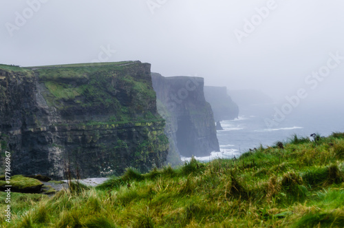  Cliffs of Moher in Ireland on a Cloudy Day © Jose Morquecho