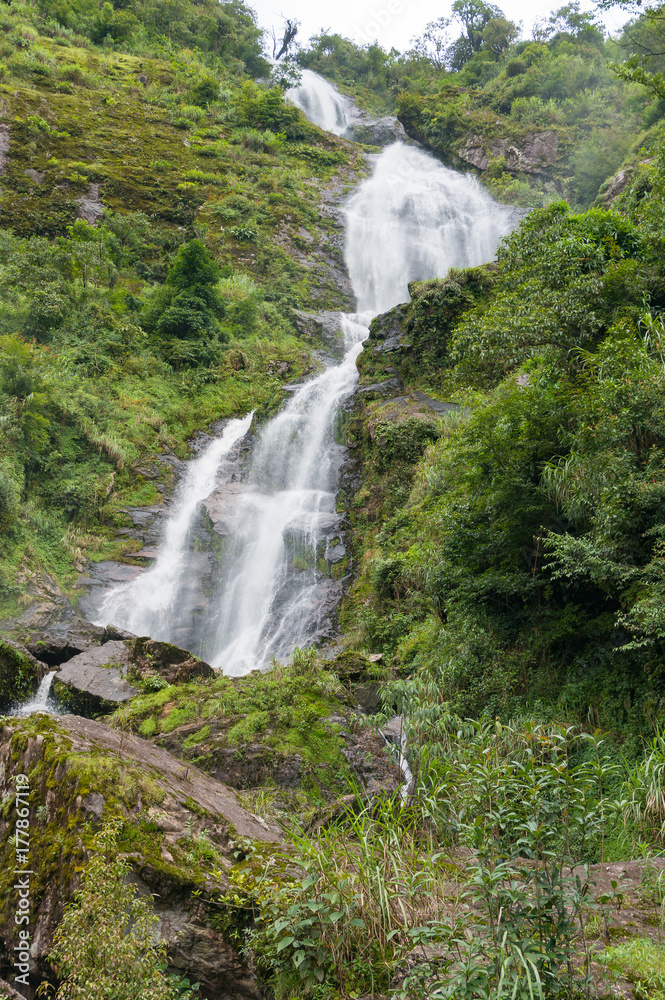 Spectacular waterfall in tropical forest Spectacular waterfall in tropical forest