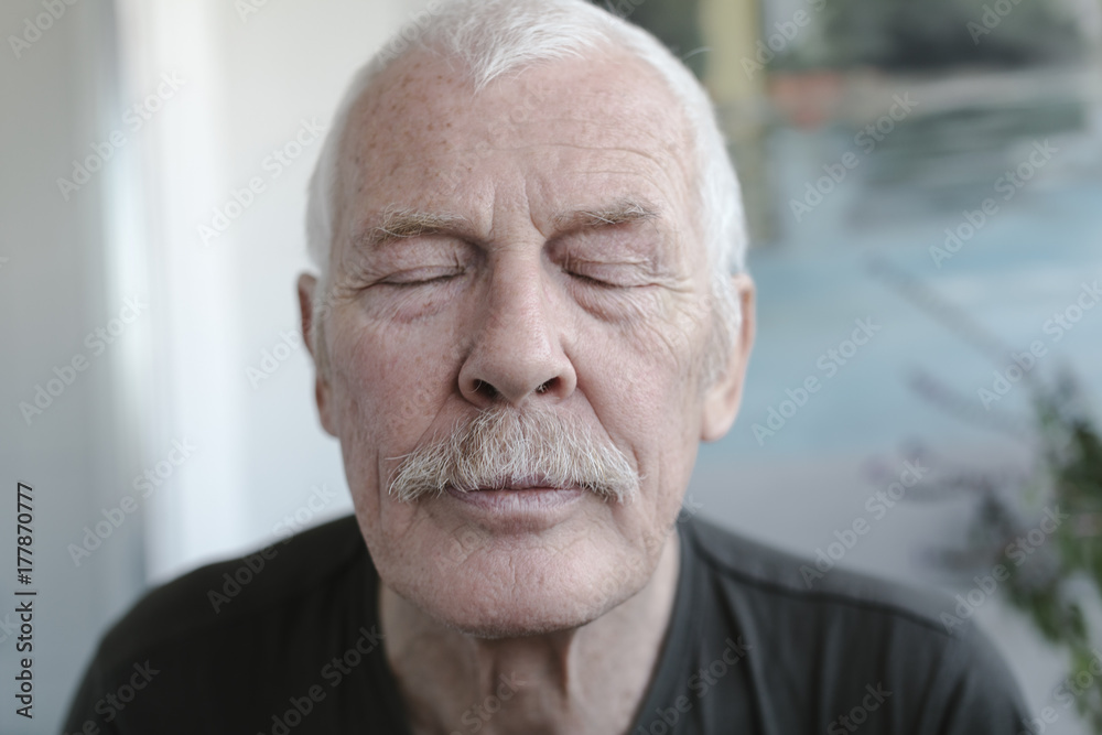 Senior Man with Eyes Closes Senior Man with Eyes Closes