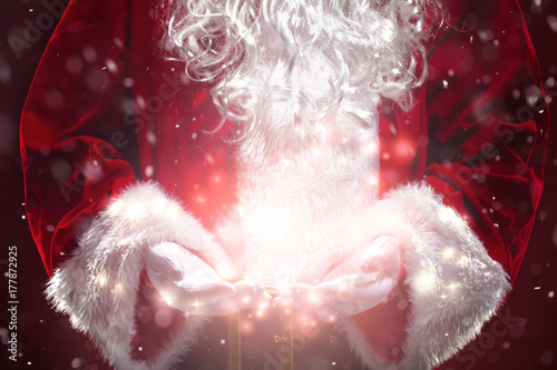 Santa Claus with magic lights