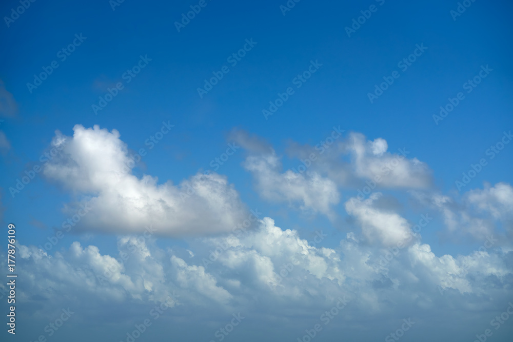 Blue summer sky white cumulus clouds