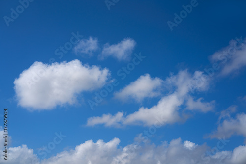 Blue summer sky white cumulus clouds