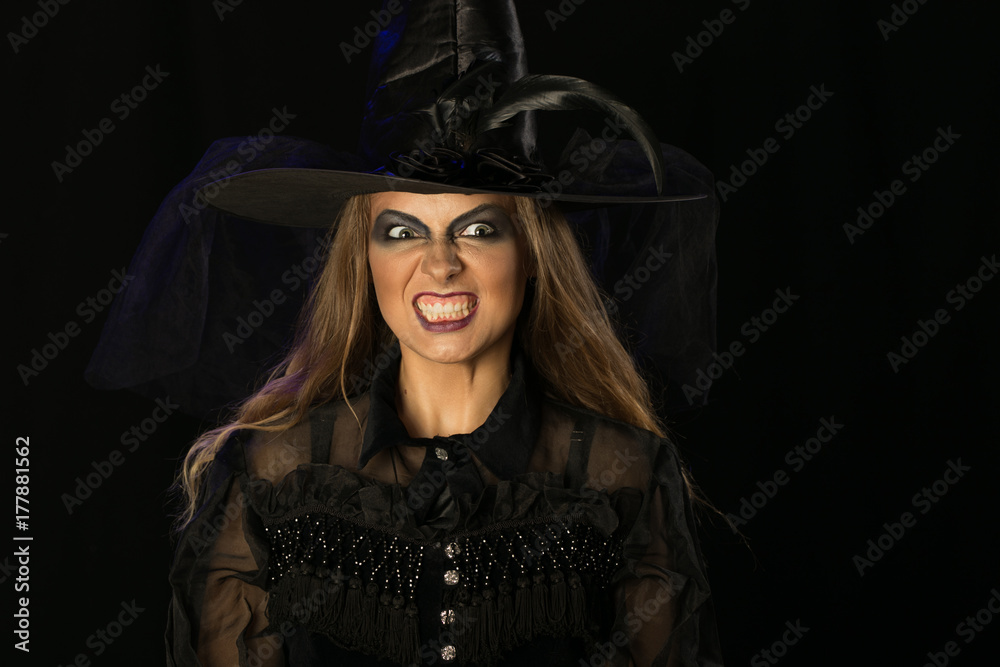 cheerful girl witch on halloween in studio cheerful girl witch on halloween in studio