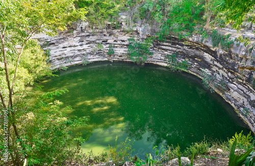 Cenote Sagrado sacred sinkhole Chichen Itza photo