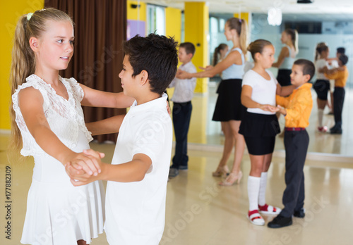 Children enjoying of partner dance