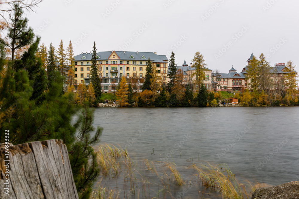Strbske Pleso. Luxury Hotel at Strbske Pleso Lake. Autumn colours, rainy day.