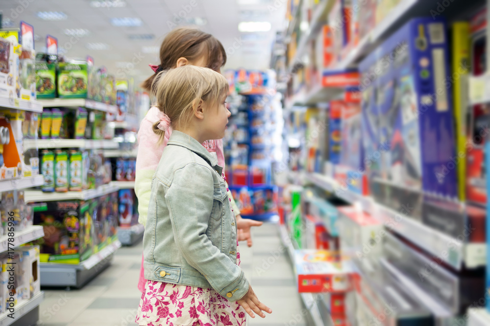 Little girls   in   toy store