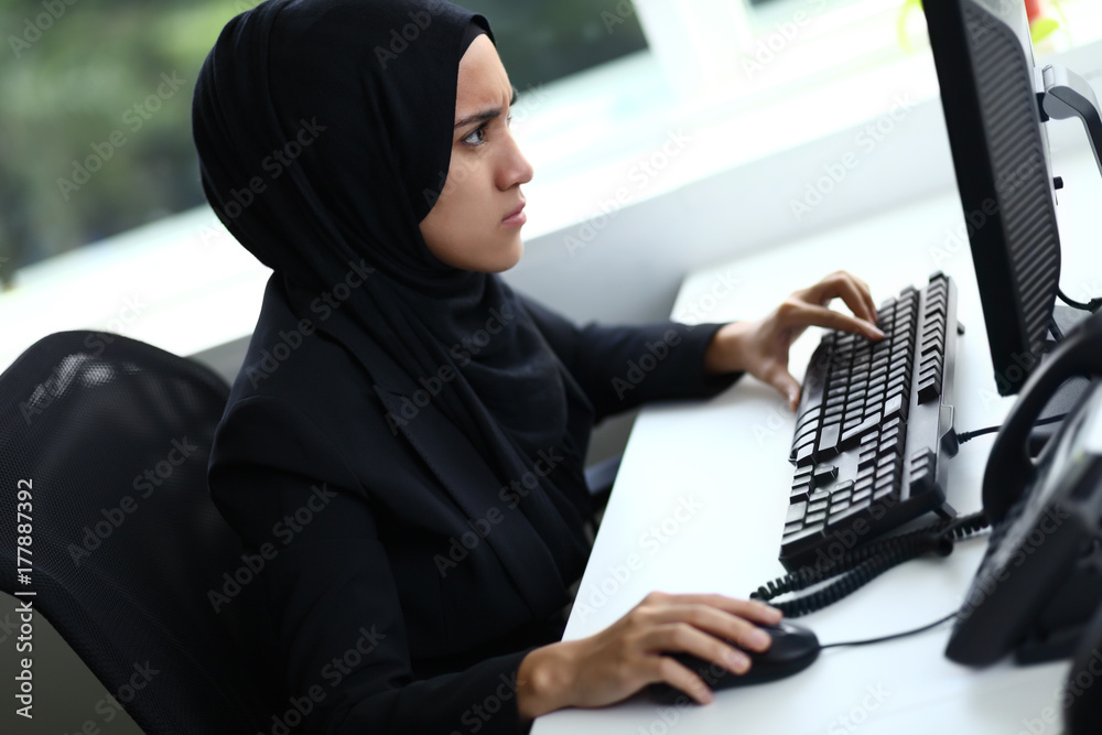 Beautiful muslim lady looking stress at work Beautiful muslim lady looking stress at work
