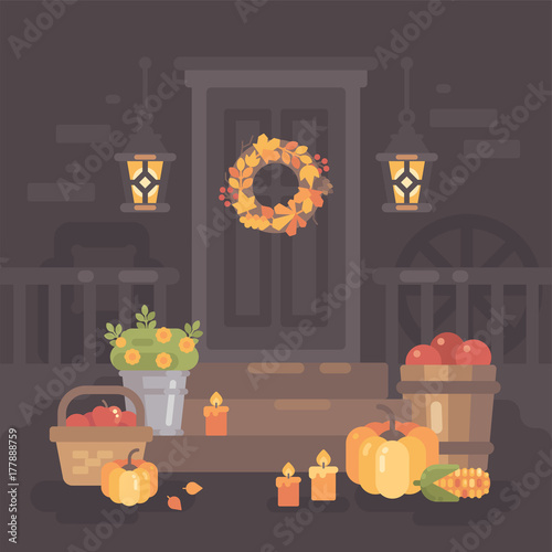 Autumn porch decorated with lanterns, vegetables and leaves. Thanksgiving day home decoration
