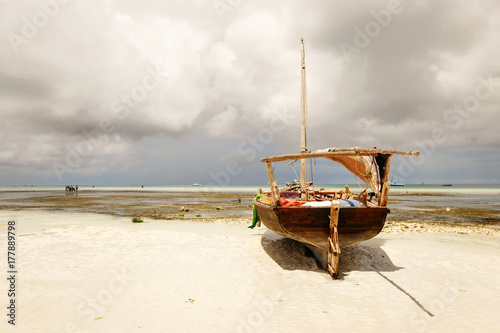 Old wooden fishing boat on shores of the Indian Ocean