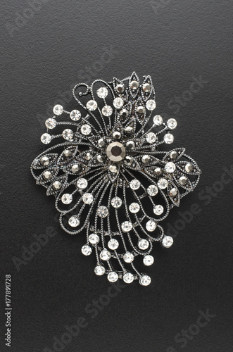 Fényképezés brooch with diamonds isolated on black background