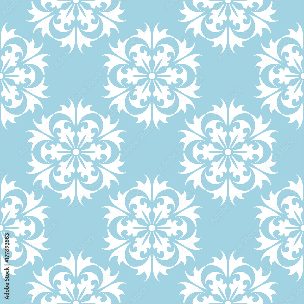 White floral seamless design on blue background