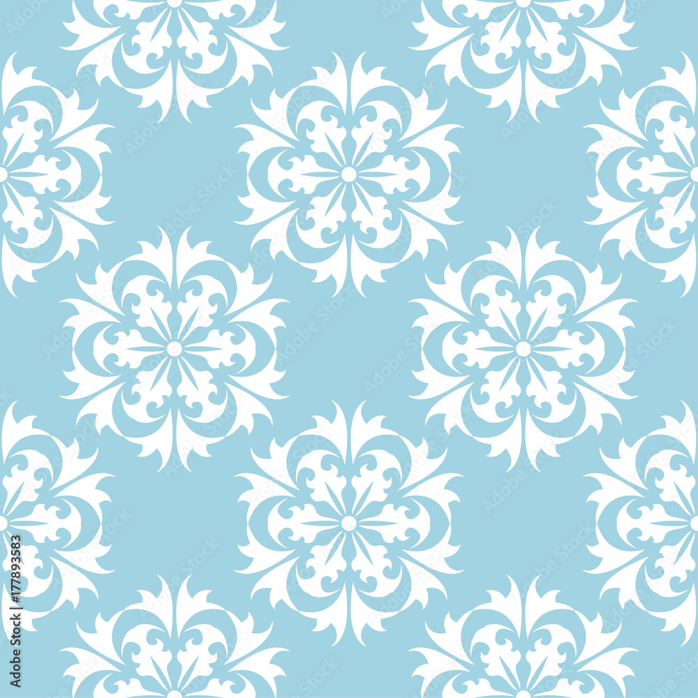 White floral seamless design on blue background White floral seamless design on blue background