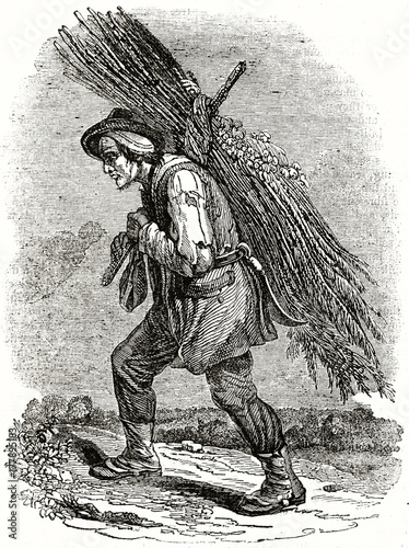 Old grayscale illustration. Profile view of a Norman peasant carrying fagot walking to the left. By unidentified author, published on the Penny Magazine, London, 1835