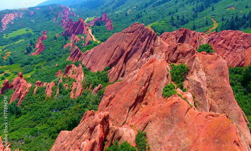 Roxborough Red Sandstone Outcroppings On Green Mountainside - Colorado, USA