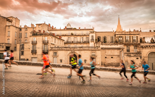 Montpellier (France) old town landscape and runners