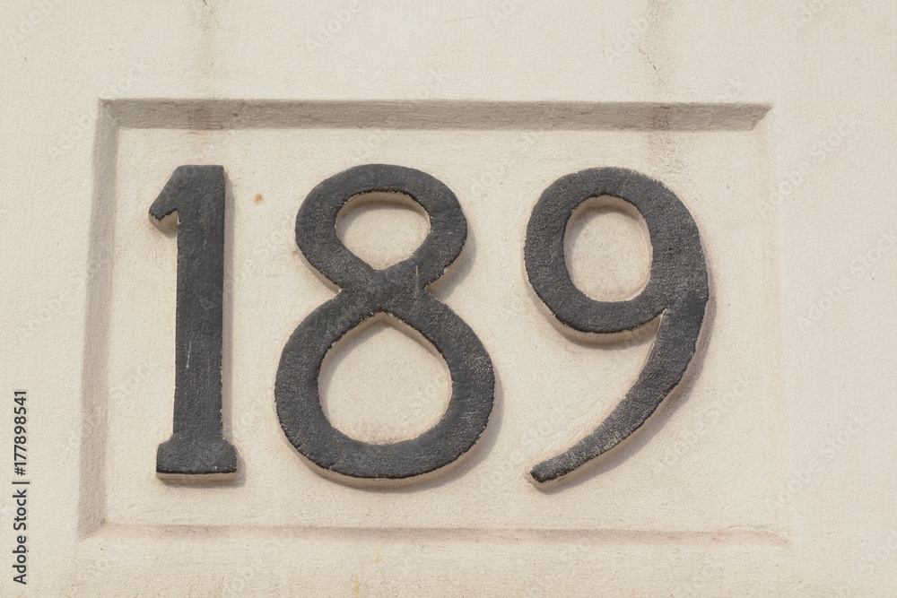 House number 189 sign painted on wall House number 189 sign painted on wall