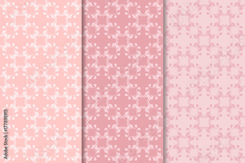 Set of floral ornaments. Pale pink vertical seamless patterns © Liudmyla