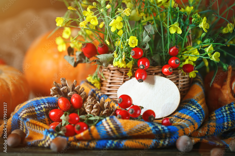 The table decorated with flowers and vegetables. Happy Thanksgiving Day. Autumn background.