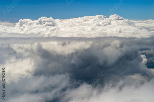 The top view on clouds from an airplane window