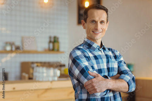 Pleasant handsome man feeling happy