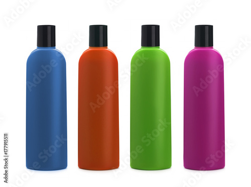 Set of colour plastic bottles with shampoo on white background. Isolated