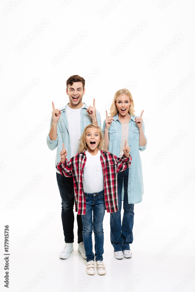 Full length portrait of a happy cheerful young family Full length portrait of a happy cheerful young family