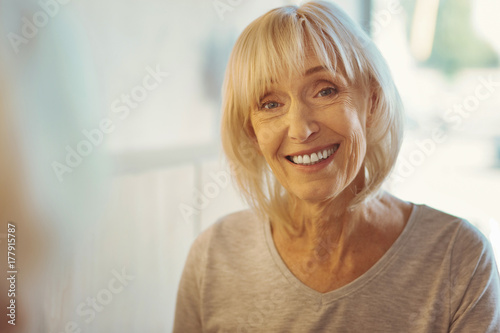 Portrait of a delighted elderly woman