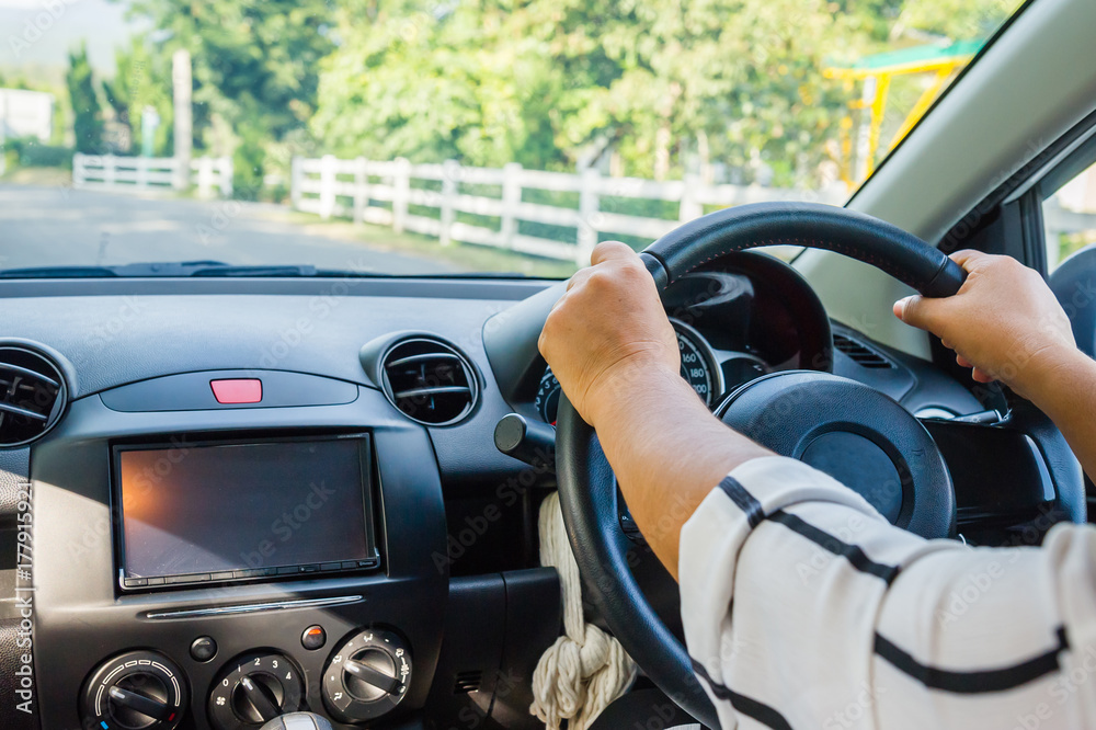 close-up of the hand of a woman driving For background close-up of the hand of a woman driving For background