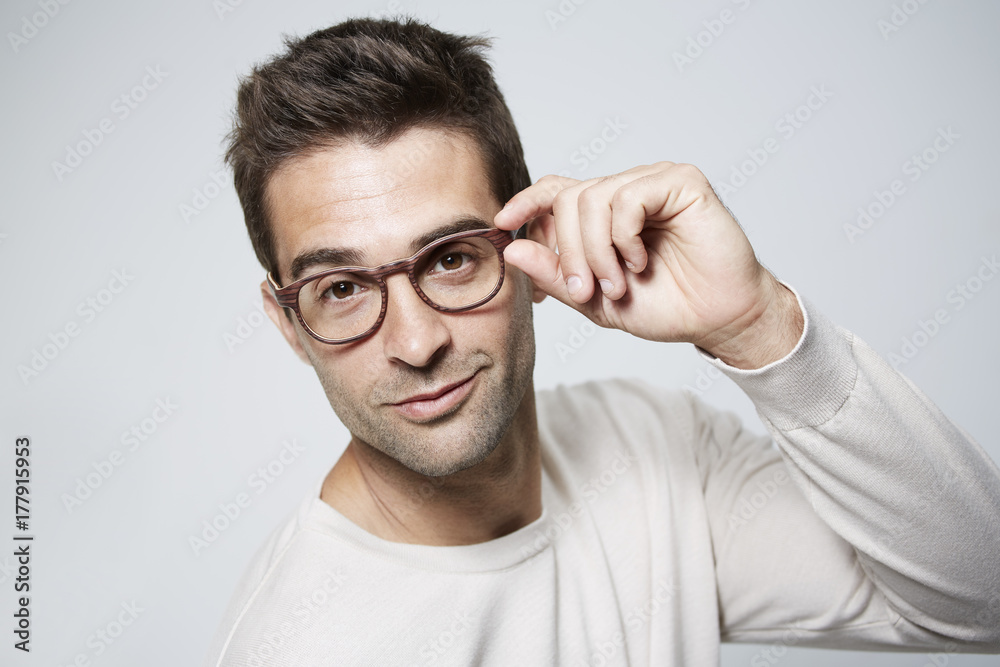 Glasses dude looking to camera, studio Glasses dude looking to camera, studio