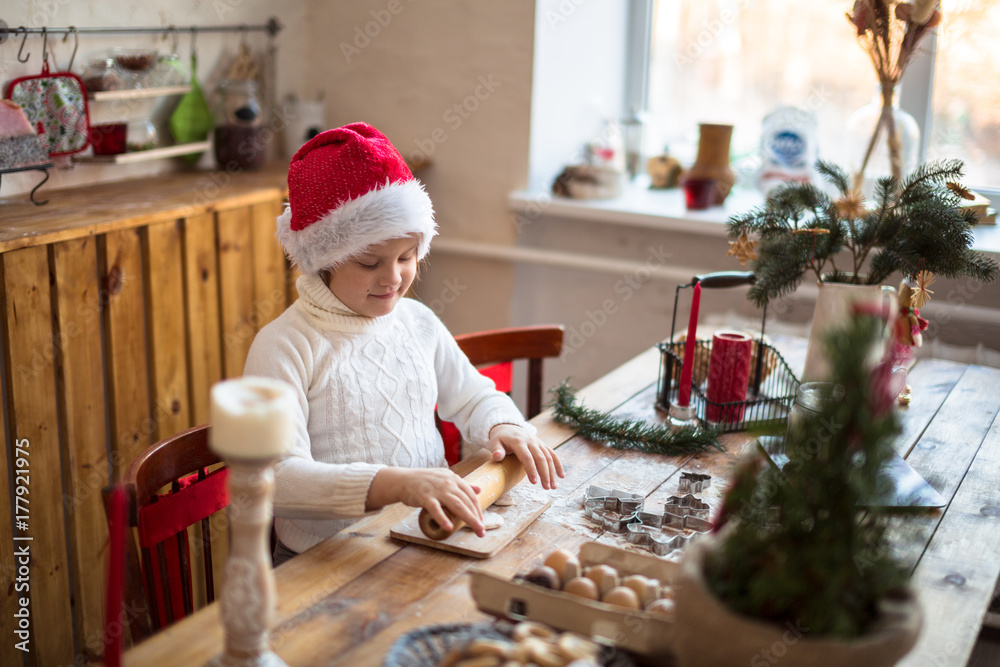 funny child girl preparing cookies, lifestyle, real nordic interior, rustic style, the brown funny child girl preparing cookies, lifestyle, real nordic interior, rustic style, the brown