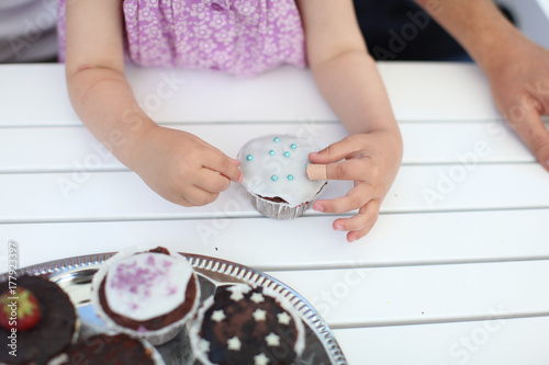 child eating homemade cake
